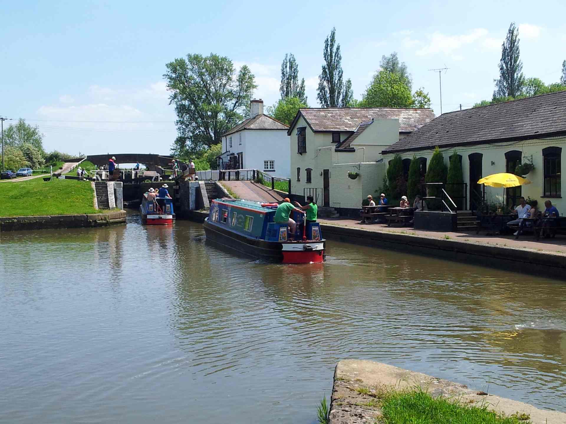  a narrow boat cruising through the countryside