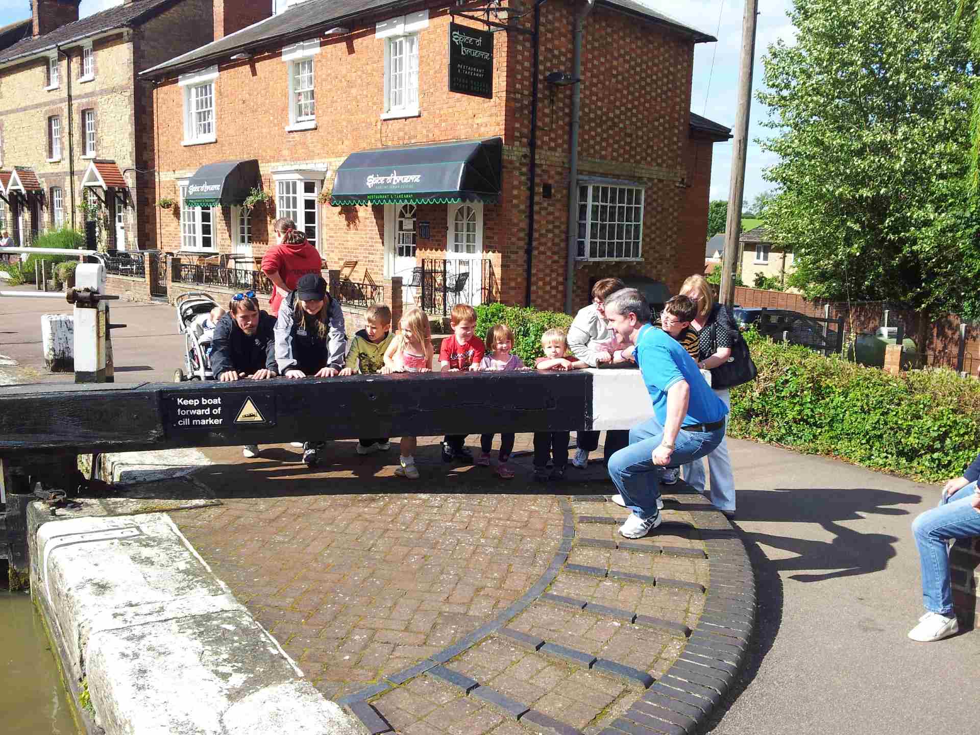  wyvern narrow boat in a lock by a pretty cottage