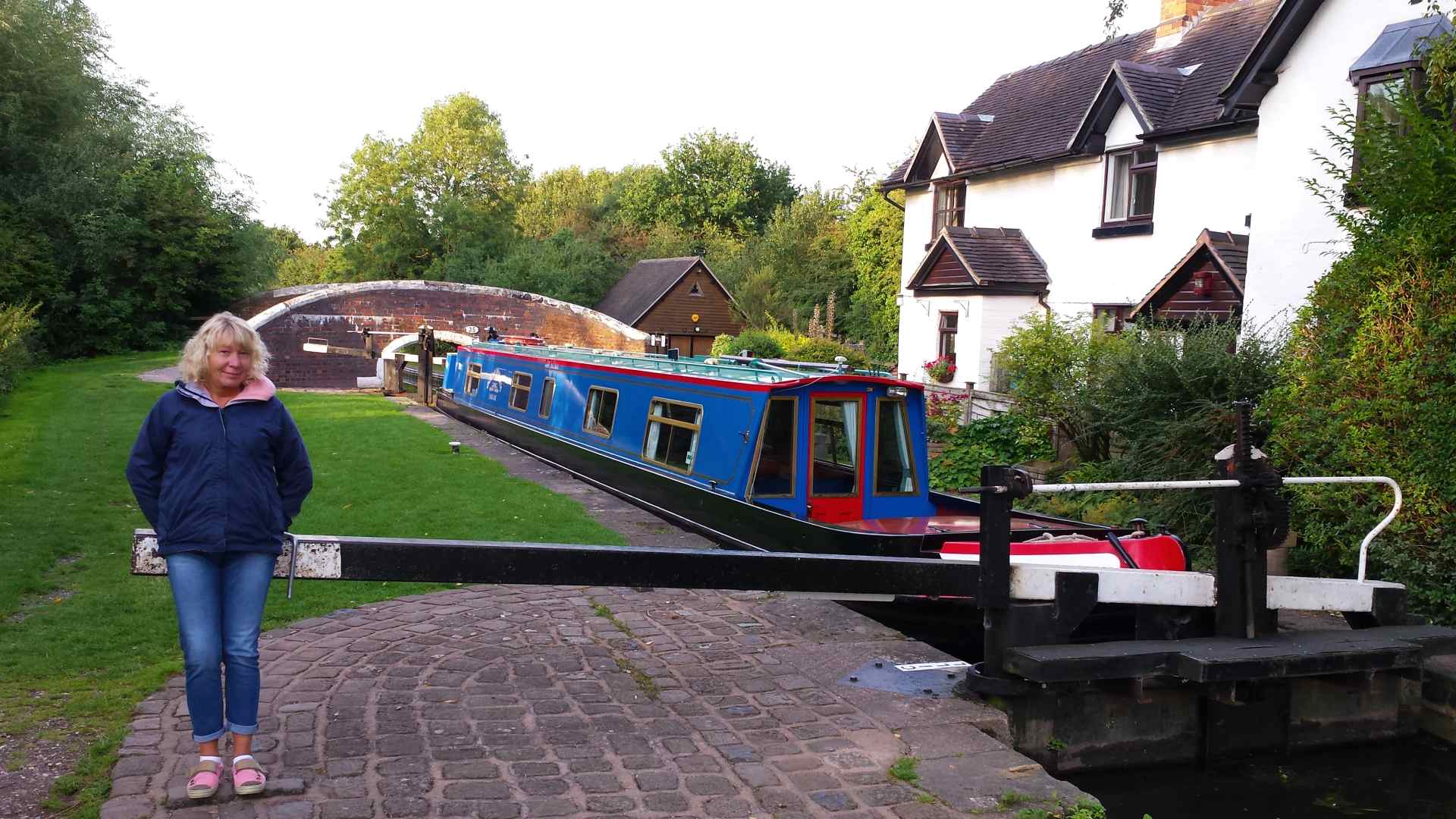  a narrow boat crossing an aqueduct