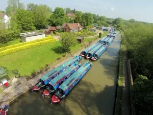 Overhead view of the Wyvern boatyard at Linslade with narrowboats moored along the canal