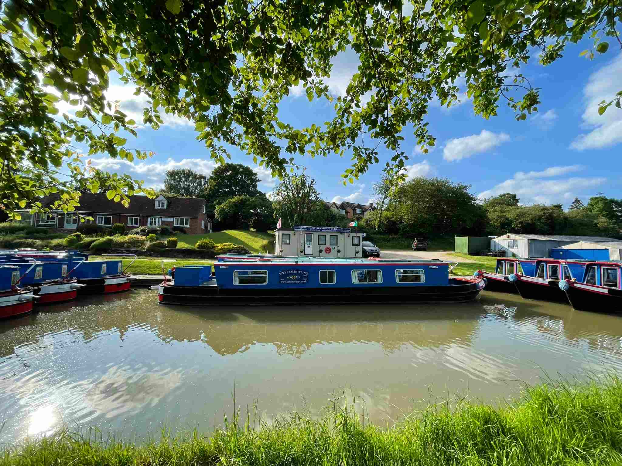  adults and children working  a lock at Stoke Bruerne